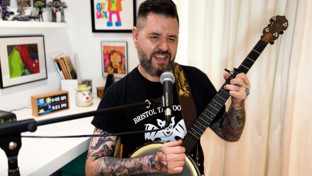 Banjo player holding a banjo